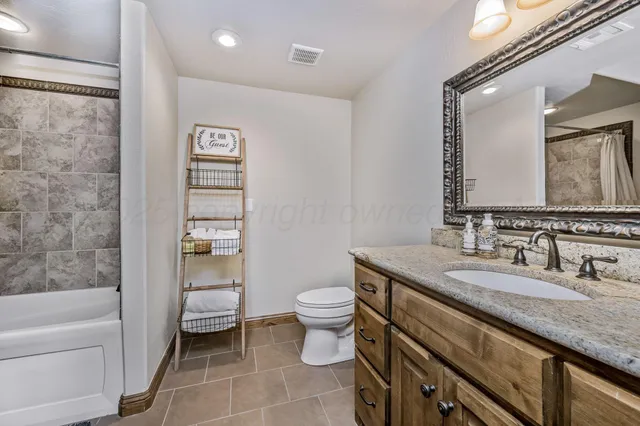 a view of a backyard with sitting area