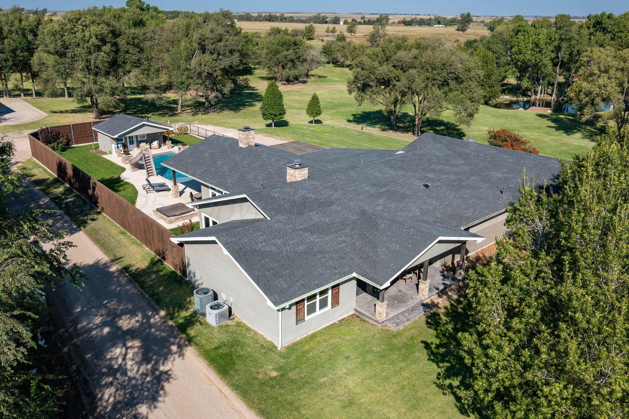 100 Thomas Lane Wheeler, TX 79096 - Photo 46 of 50 an aerial view of a house with yard swimming pool and mountain view
