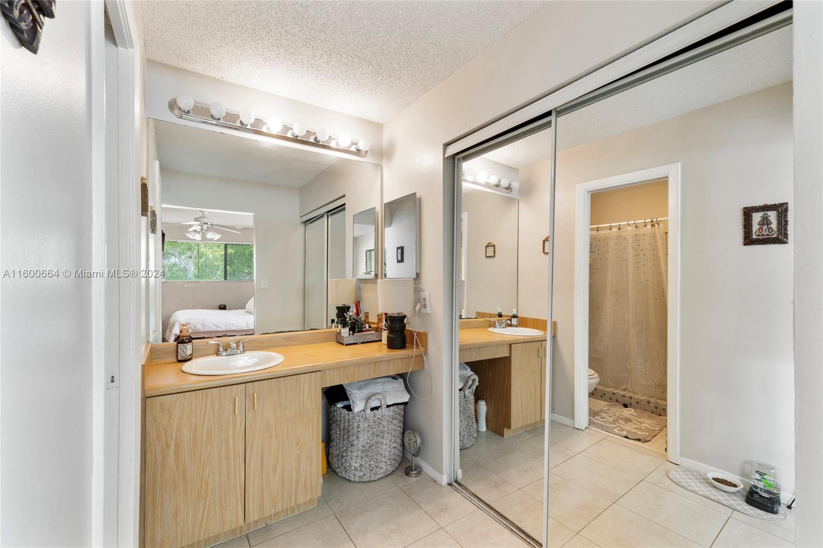 9723 Hammocks Boulevard, Unit 202 Miami, FL 33196 - Photo 10 of 15 a room with a washing machine and sink