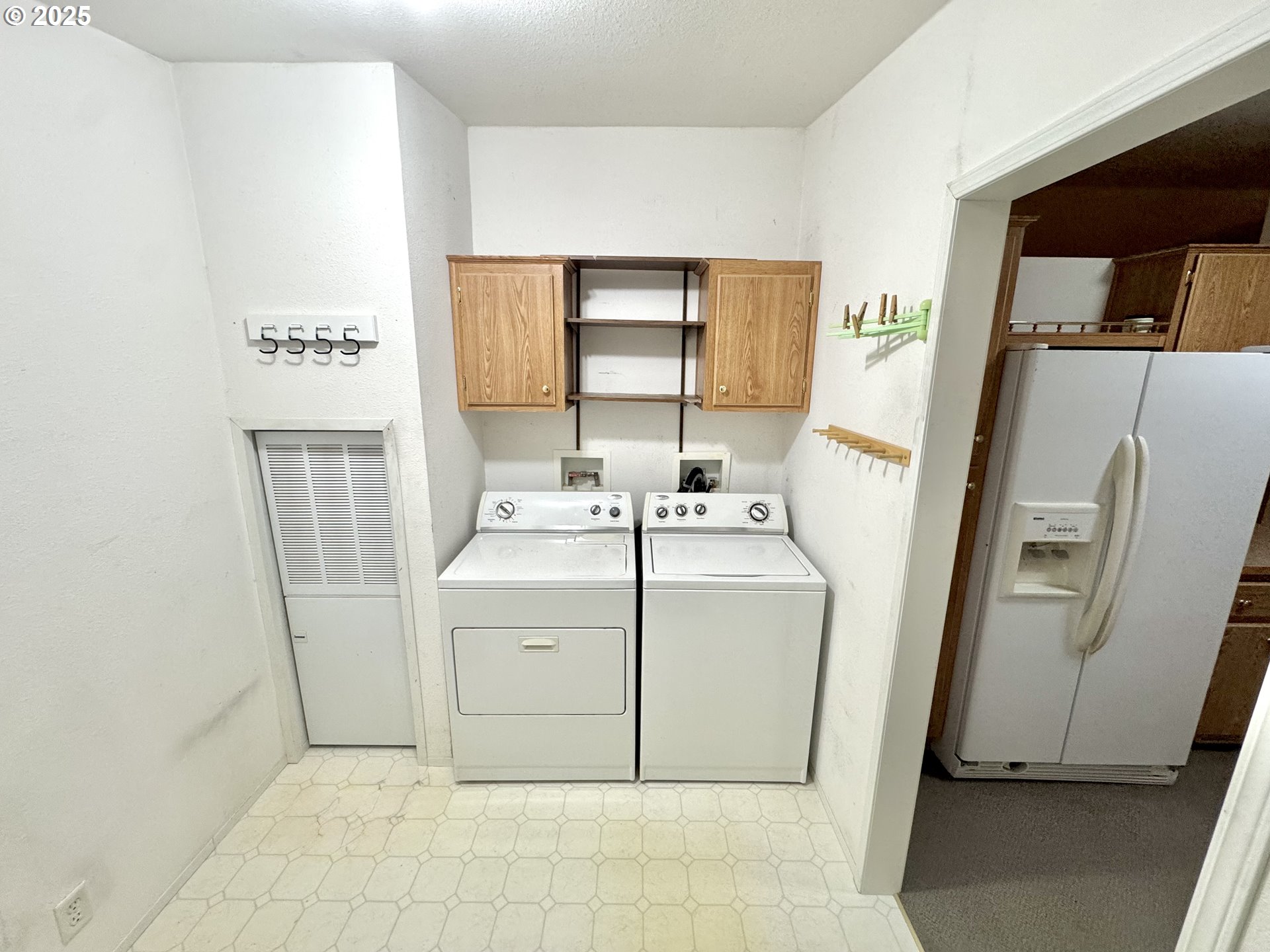 185 North 3rd Street Lakeside, OR 97449 - Photo 22 of 45 a utility room with dryer and washer