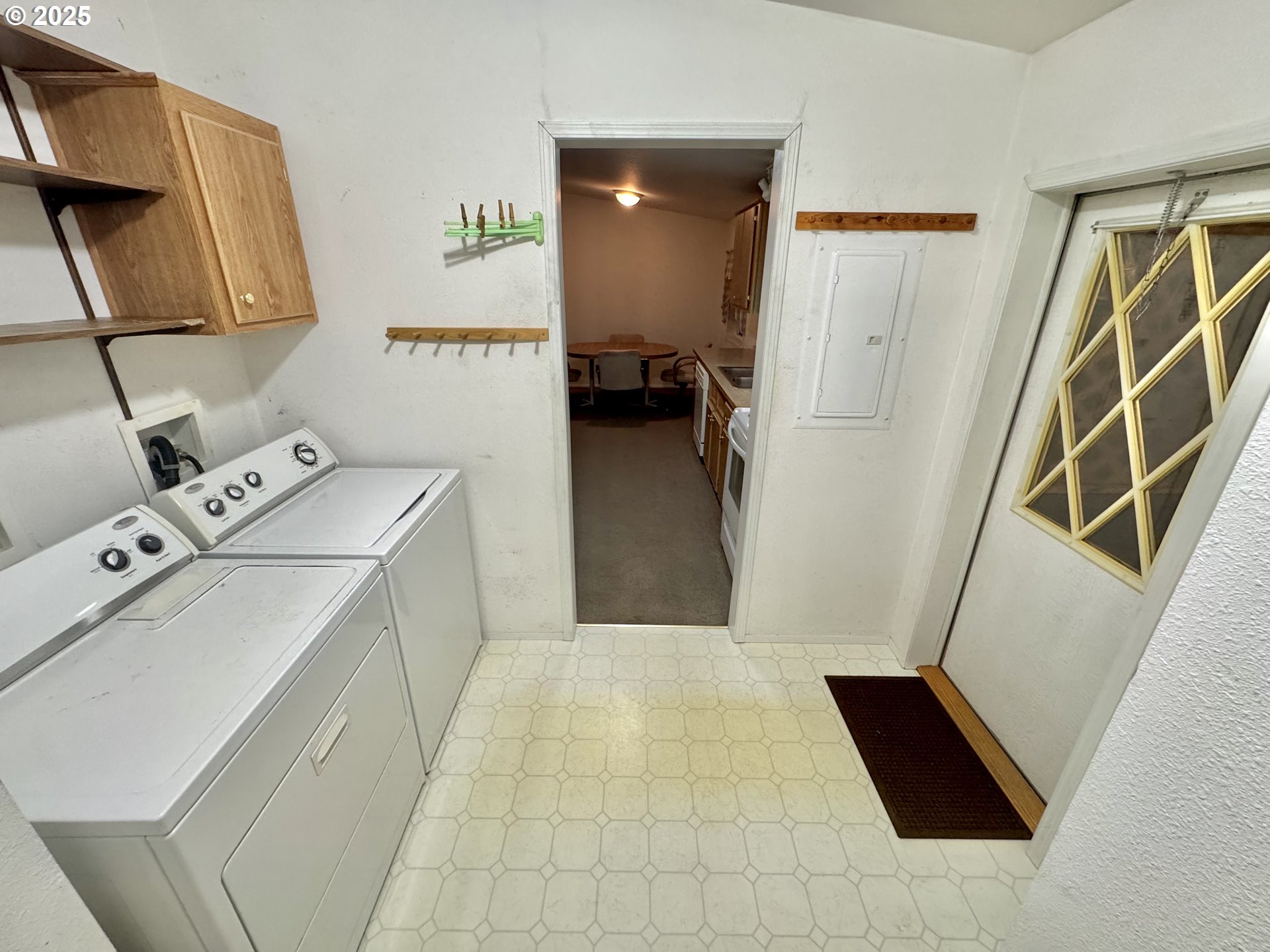 185 North 3rd Street Lakeside, OR 97449 - Photo 23 of 45 a utility room with dryer and washer