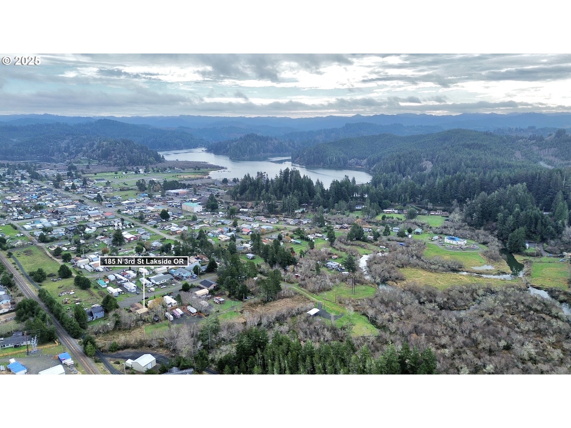 185 North 3rd Street Lakeside, OR 97449 - Photo 26 of 45 a view of an ocean and mountain