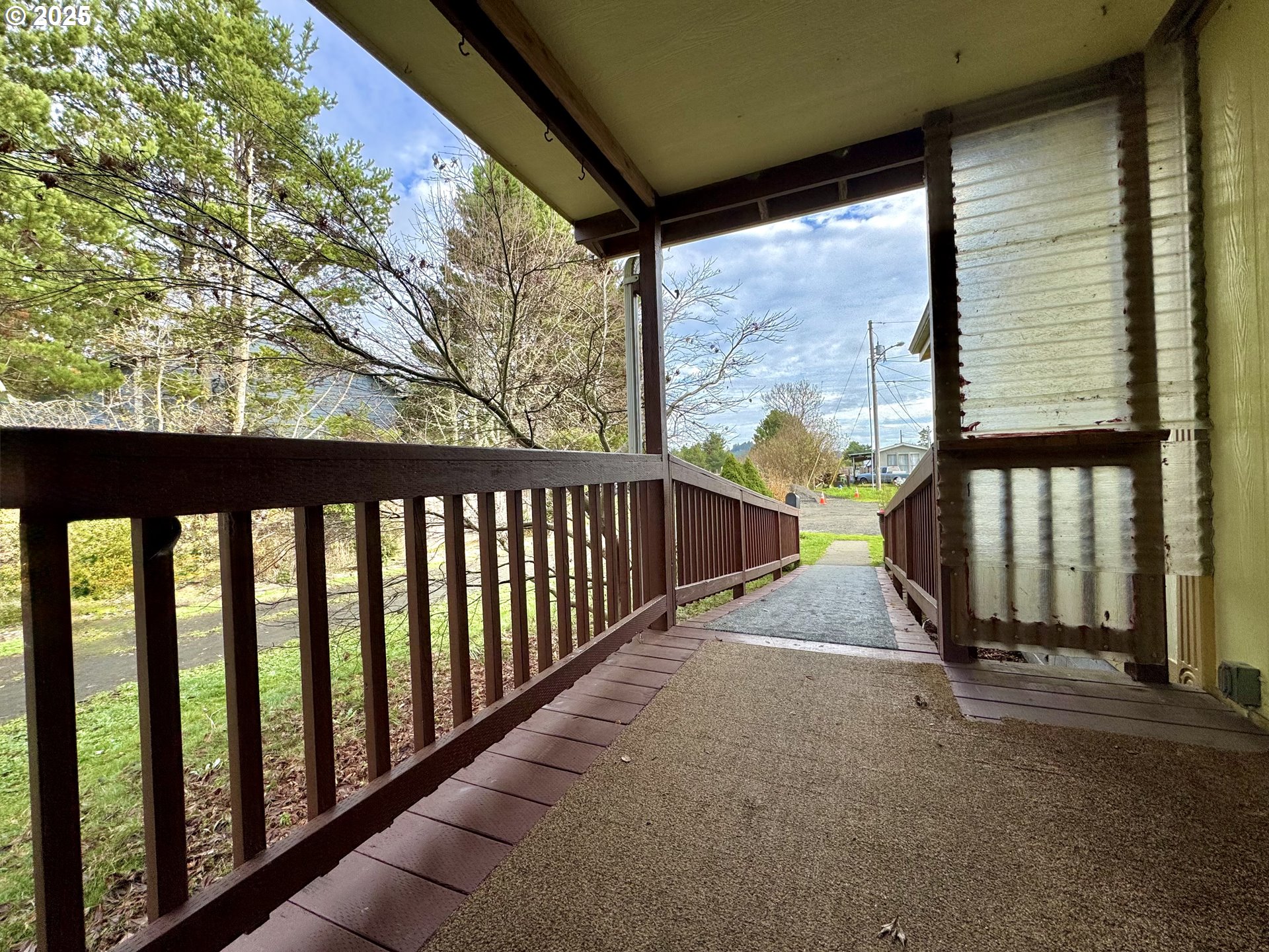 185 North 3rd Street Lakeside, OR 97449 - Photo 3 of 45 a view of a street from a balcony