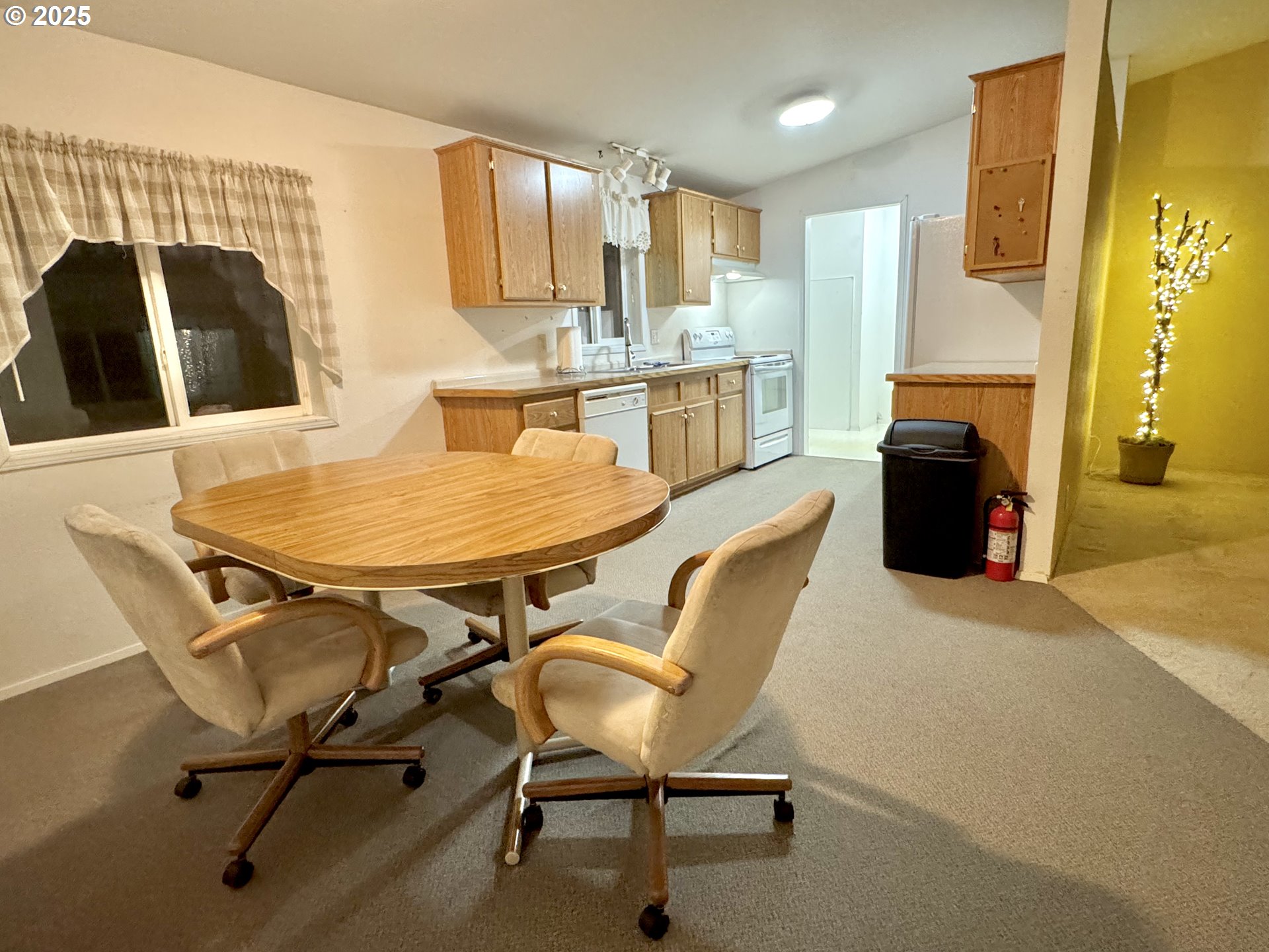 185 North 3rd Street Lakeside, OR 97449 - Photo 5 of 45 a dining room with furniture and window