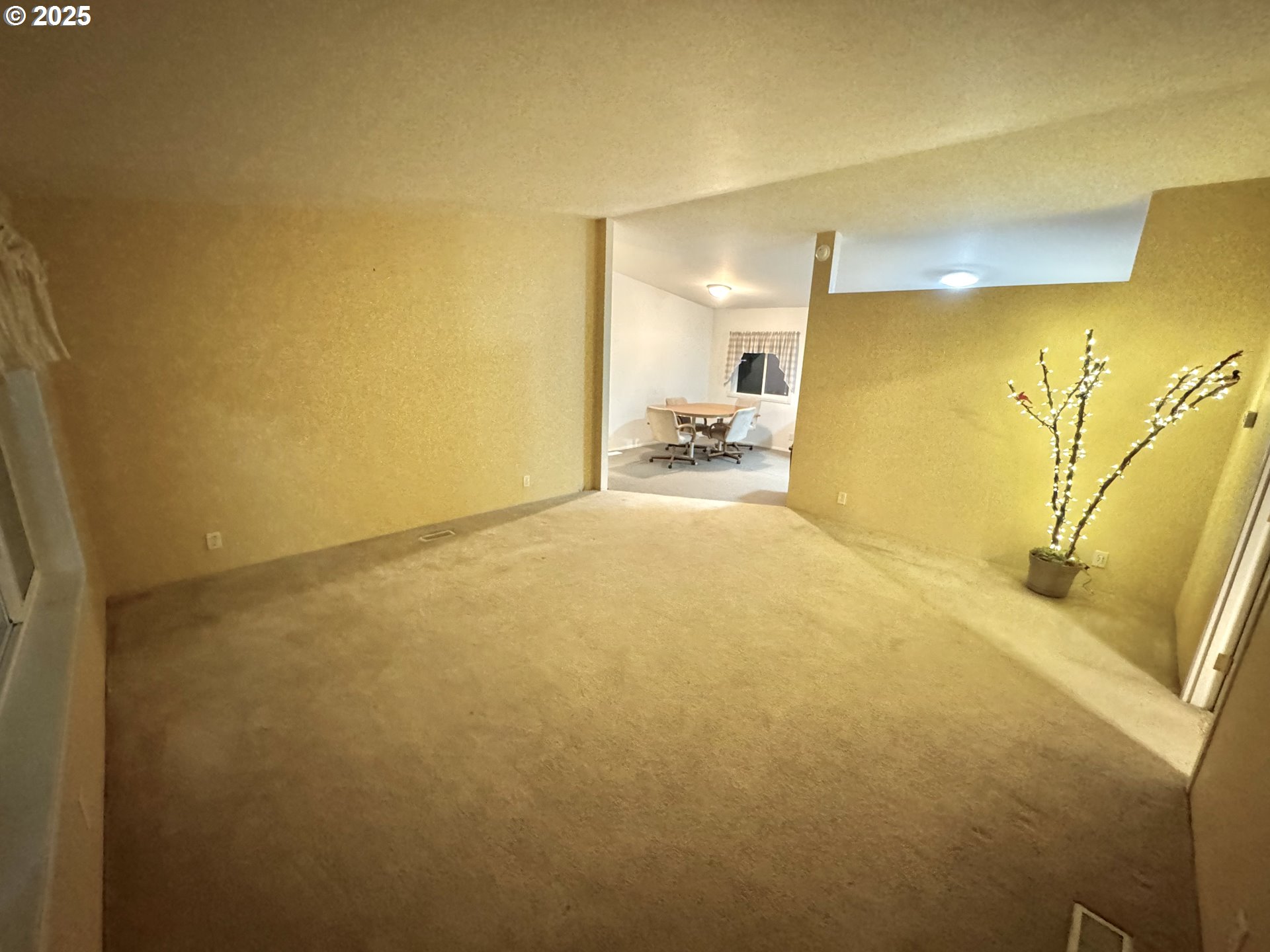 185 North 3rd Street Lakeside, OR 97449 - Photo 9 of 45 a view of a big room with windows