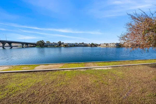 a view of an ocean from a city