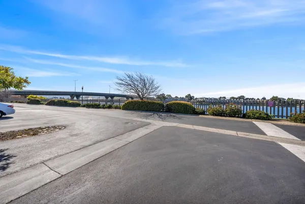 a view of a road with an ocean view