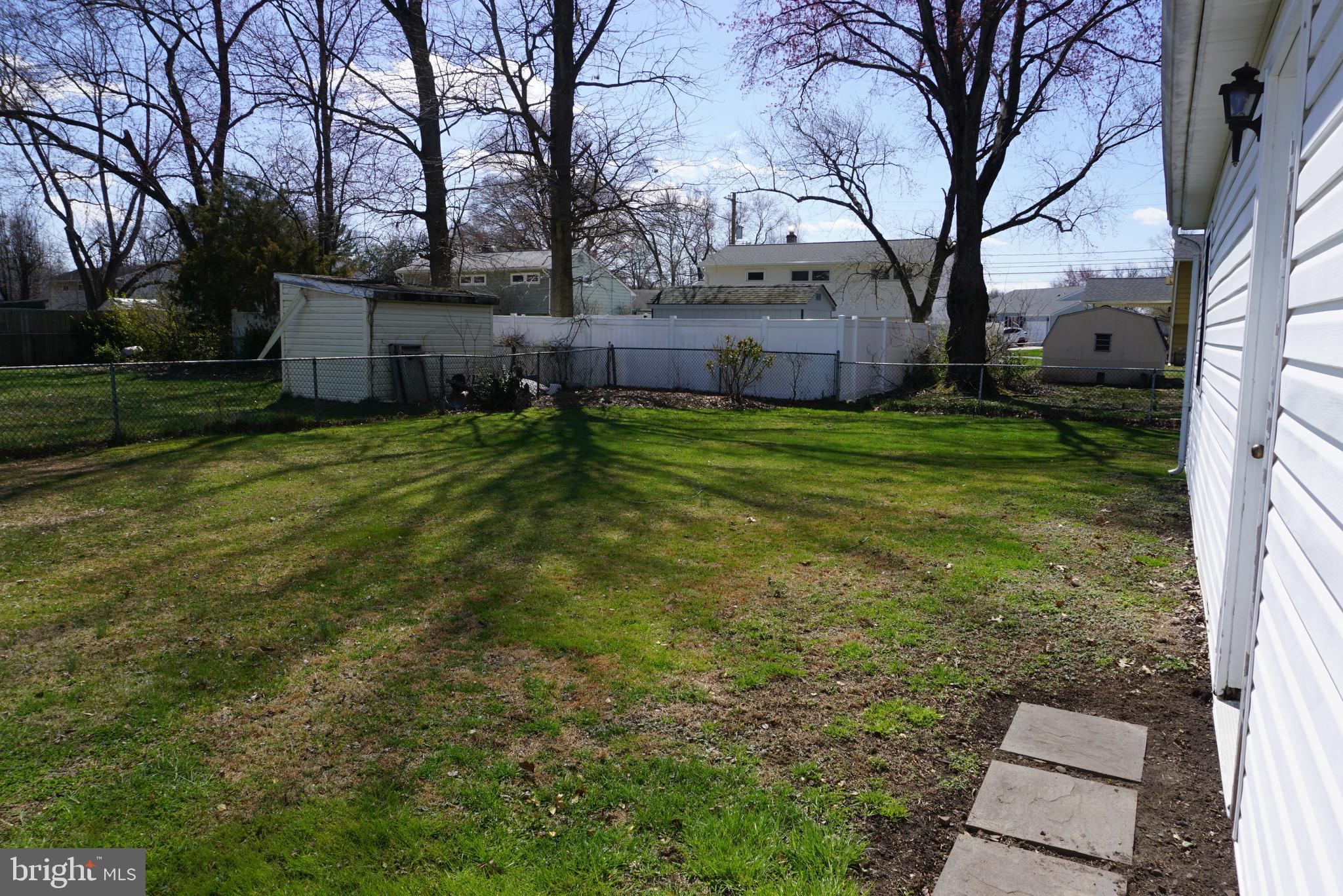 3007 Ogletown Road Newark, DE 19713 - Photo 25 of 25 a backyard of a house with lots of green space