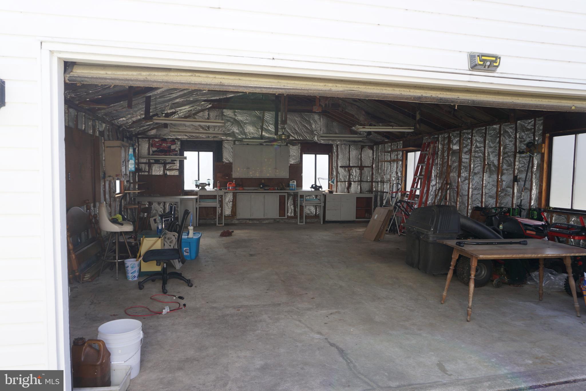 3007 Ogletown Road Newark, DE 19713 - Photo 7 of 25 a living room with furniture and a piano