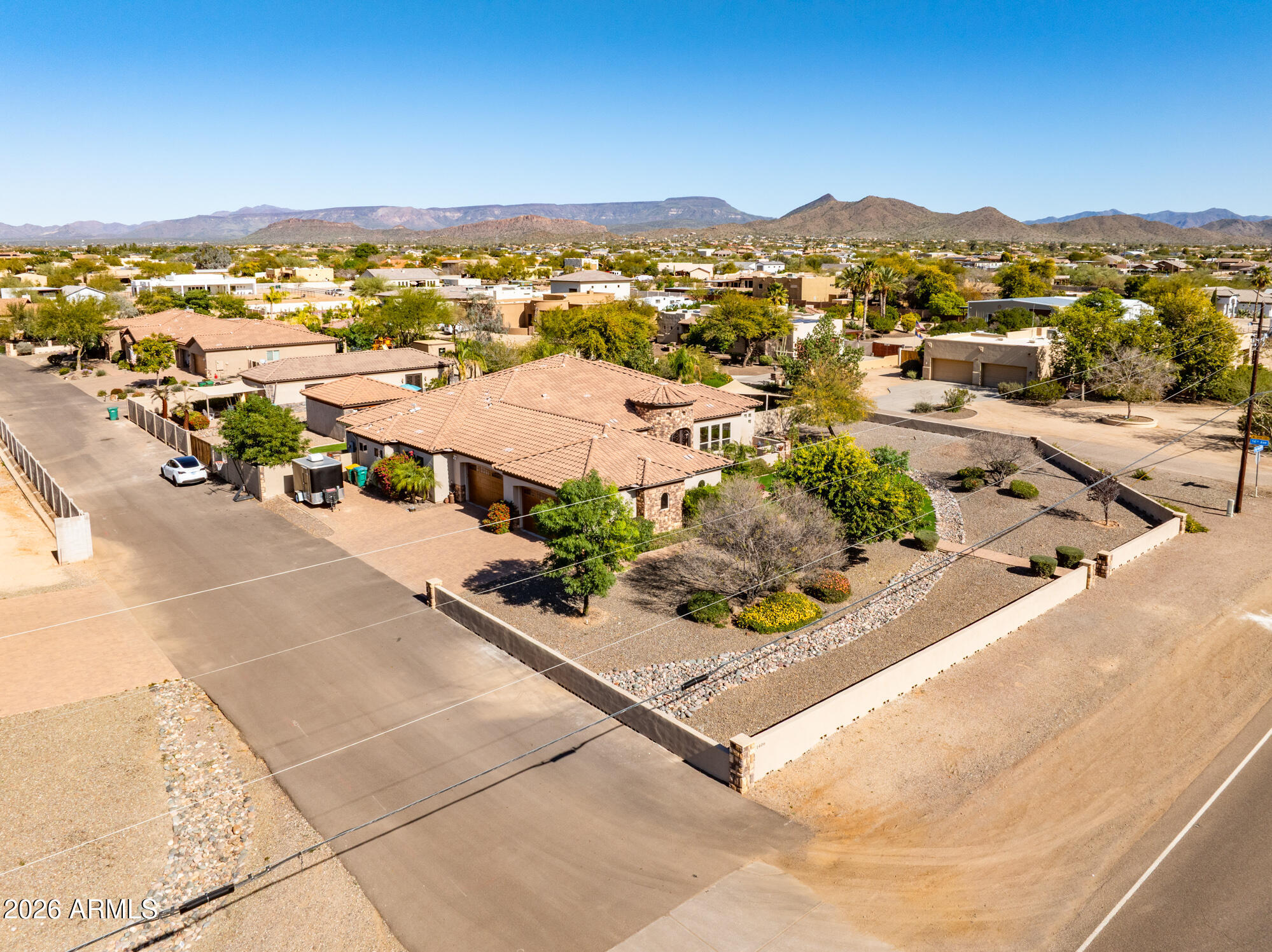1406 West Joy Ranch Road Phoenix, AZ 85086 - Photo 12 of 58 an aerial view of residential houses with outdoor space