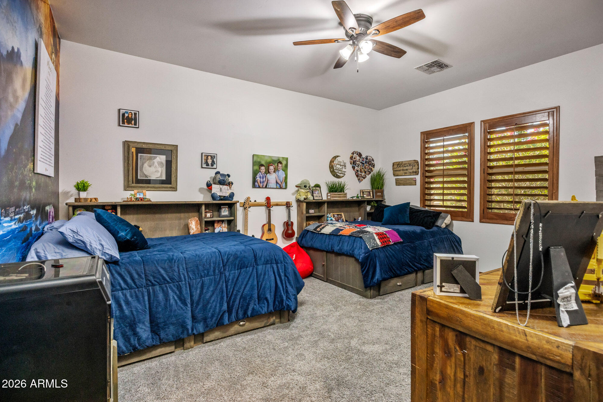 1406 West Joy Ranch Road Phoenix, AZ 85086 - Photo 34 of 58 a living room with furniture and a window