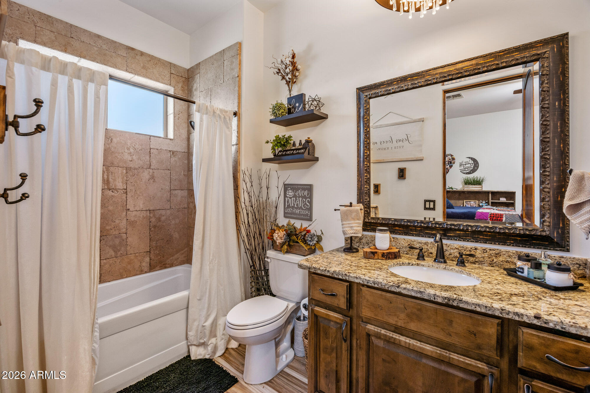 1406 West Joy Ranch Road Phoenix, AZ 85086 - Photo 35 of 58 a bathroom with a granite countertop sink toilet and shower