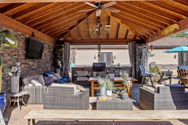 a outdoor space with patio the couches and a dining table with garden view