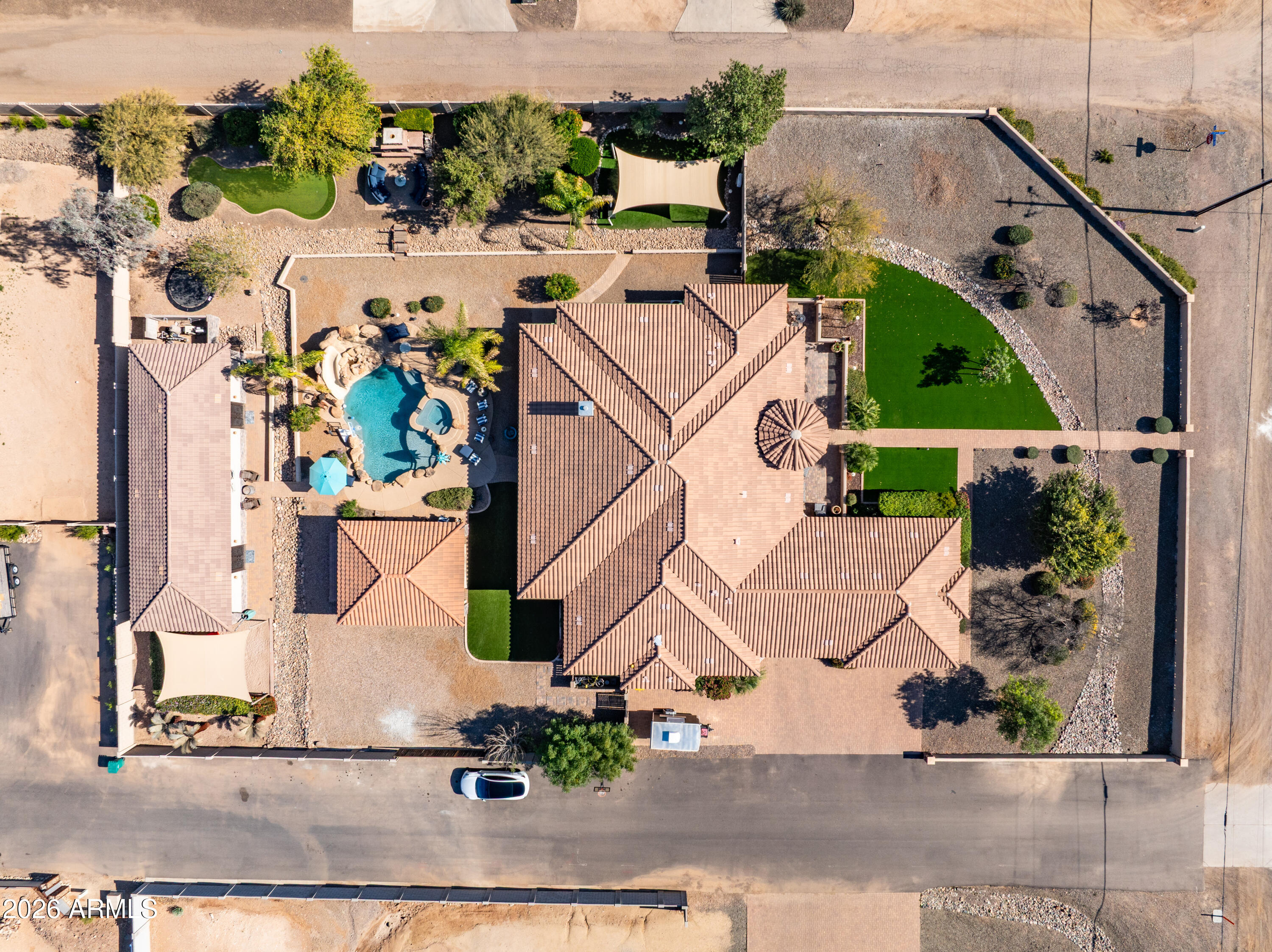 1406 West Joy Ranch Road Phoenix, AZ 85086 - Photo 4 of 58 an aerial view of multiple houses with yard