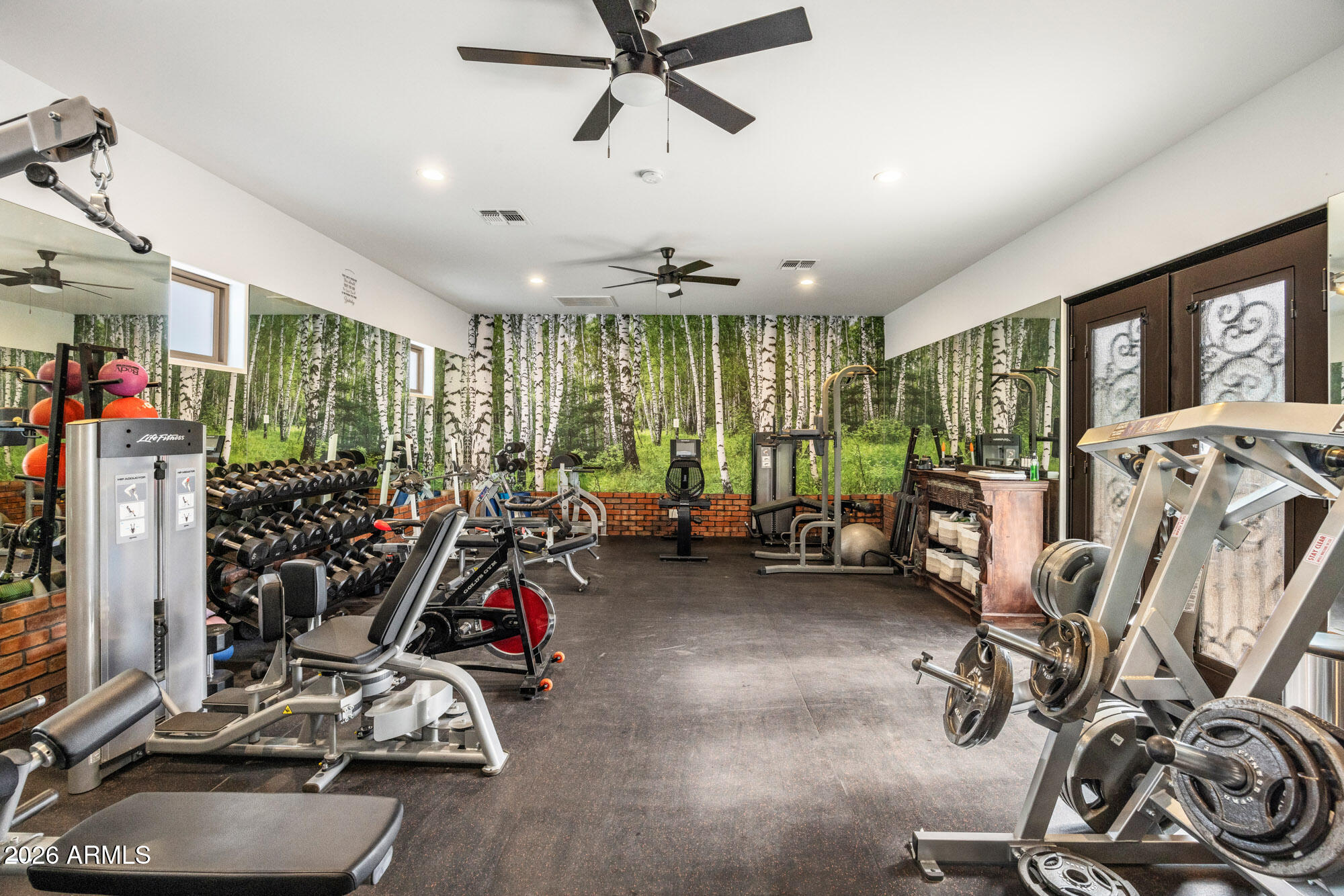 1406 West Joy Ranch Road Phoenix, AZ 85086 - Photo 51 of 58 a view of a room with gym equipment