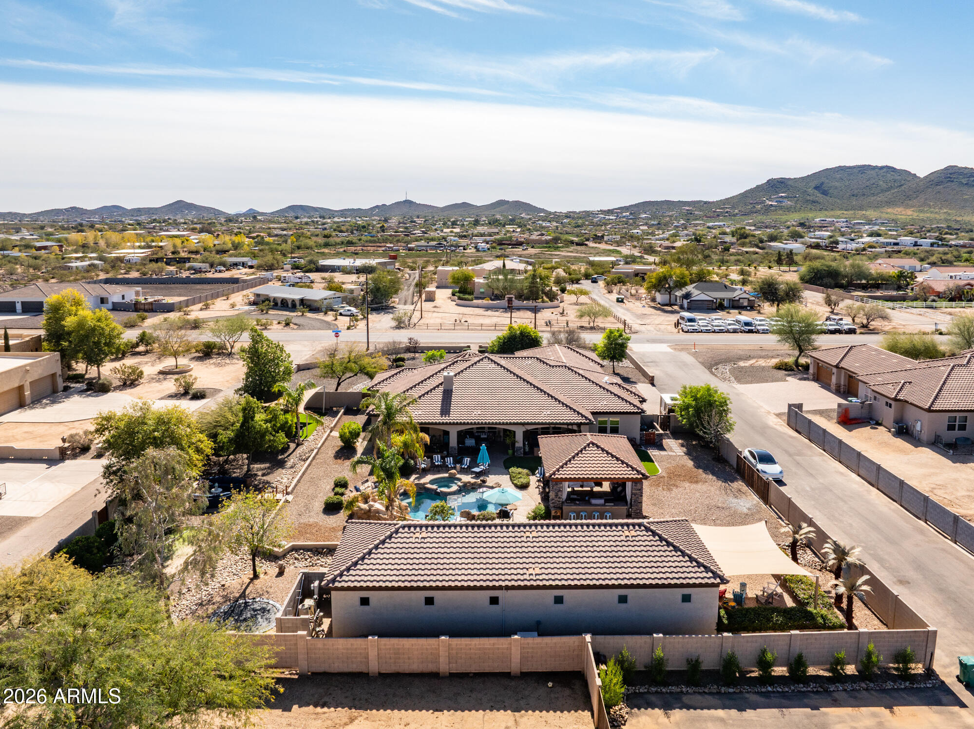 1406 West Joy Ranch Road Phoenix, AZ 85086 - Photo 7 of 58 a view of a town with mountains in the background