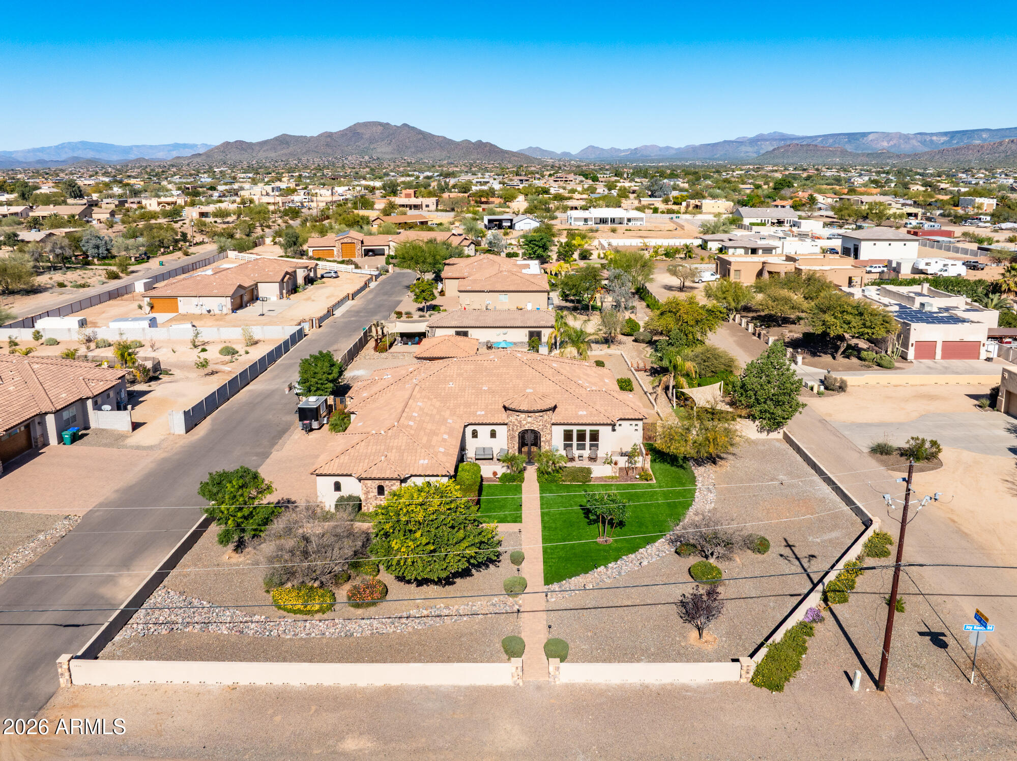 1406 West Joy Ranch Road Phoenix, AZ 85086 - Photo 10 of 58 an aerial view of residential houses with outdoor space
