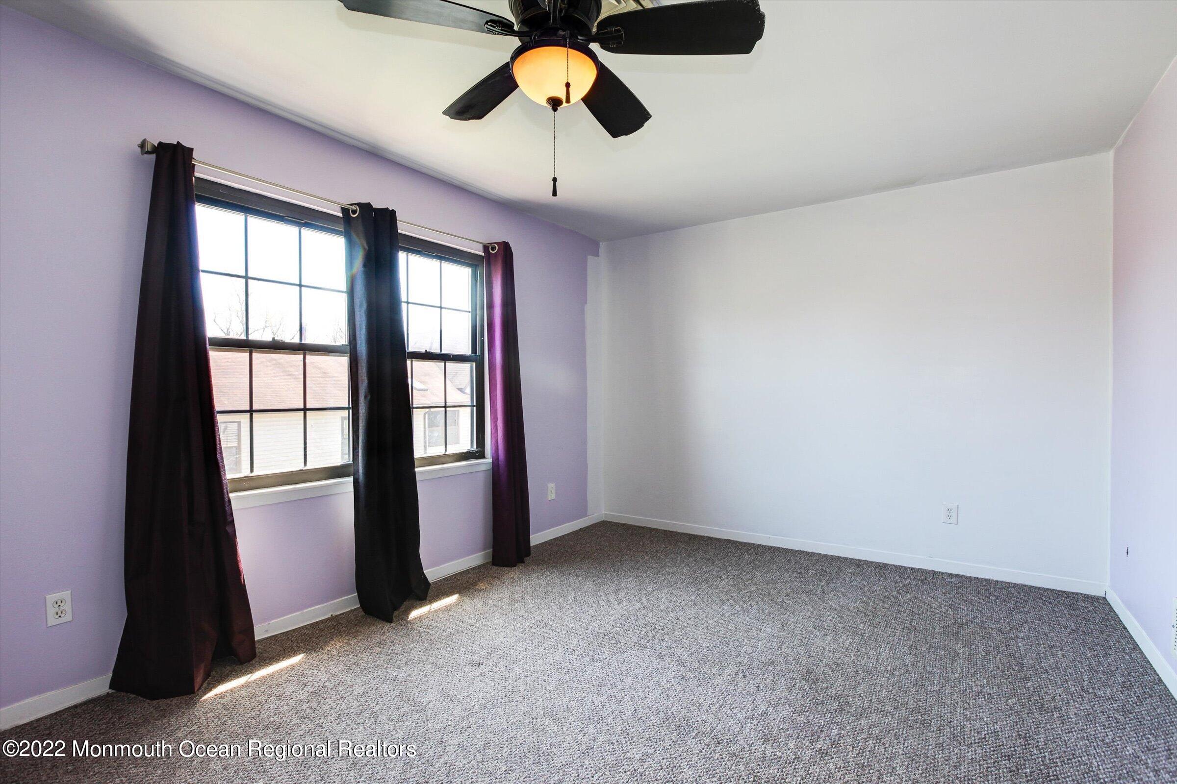 51 Queens Way Englishtown, NJ 07726 - Photo 17 of 25 a view of an empty room with a window