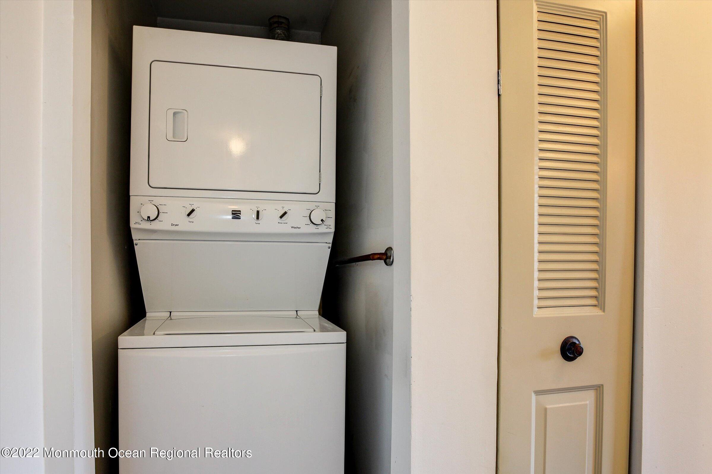 51 Queens Way Englishtown, NJ 07726 - Photo 23 of 25 a utility room with dryer and washer