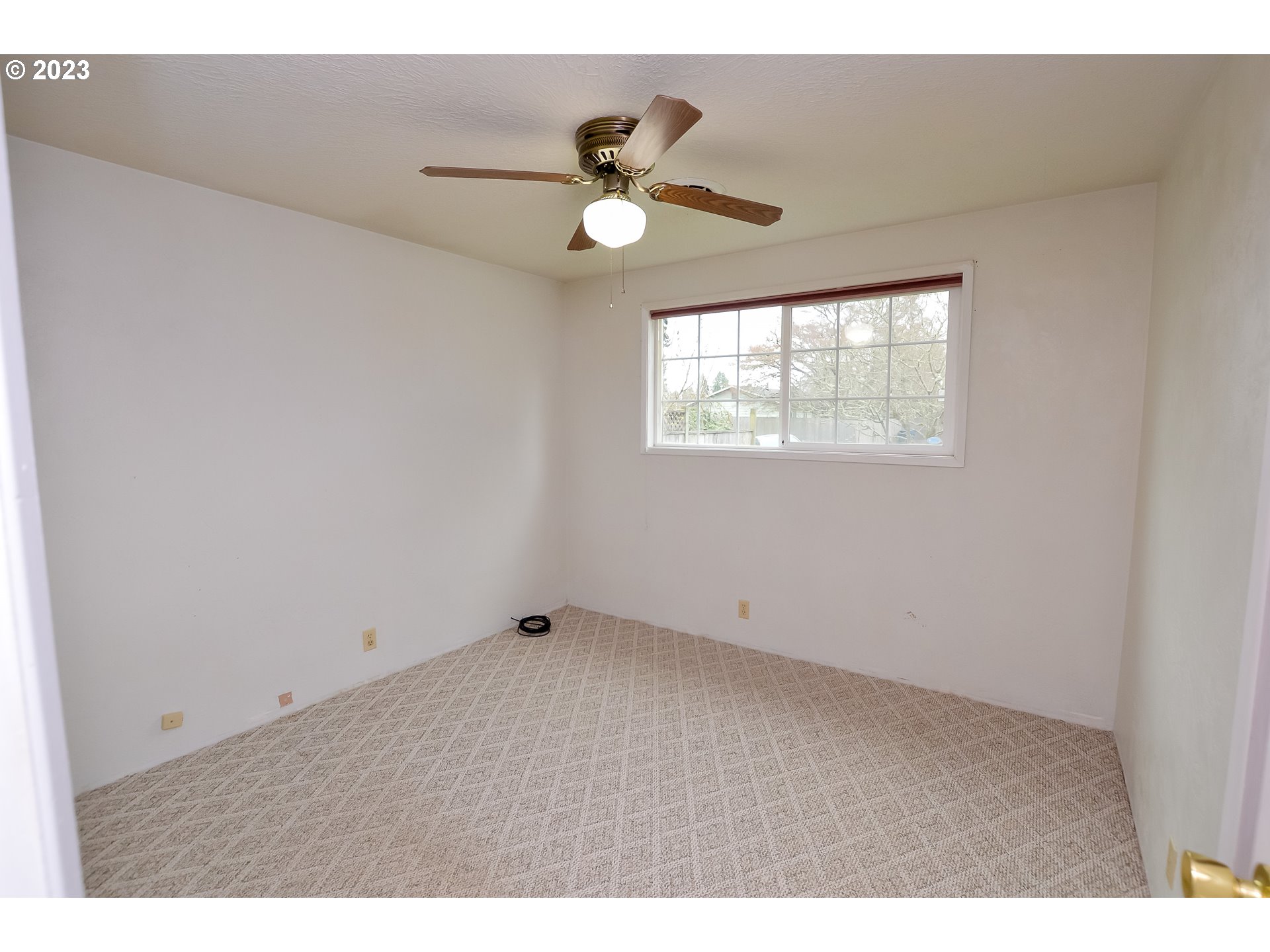 2470 16th Street Springfield, OR 97477 - Photo 23 of 32 a view of an empty room with a window