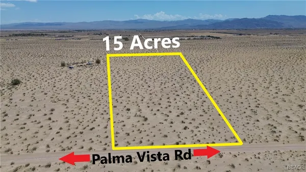 a view of swimming pool with seating space