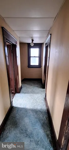 a bathroom with a sink a mirror and a bathtub