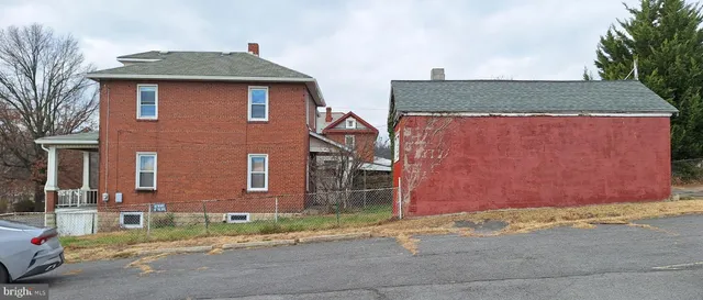 a front view of house with a yard