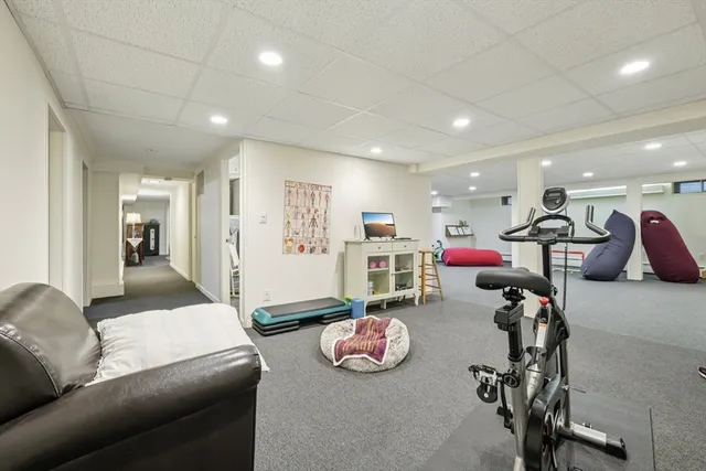 a living room with furniture and a table