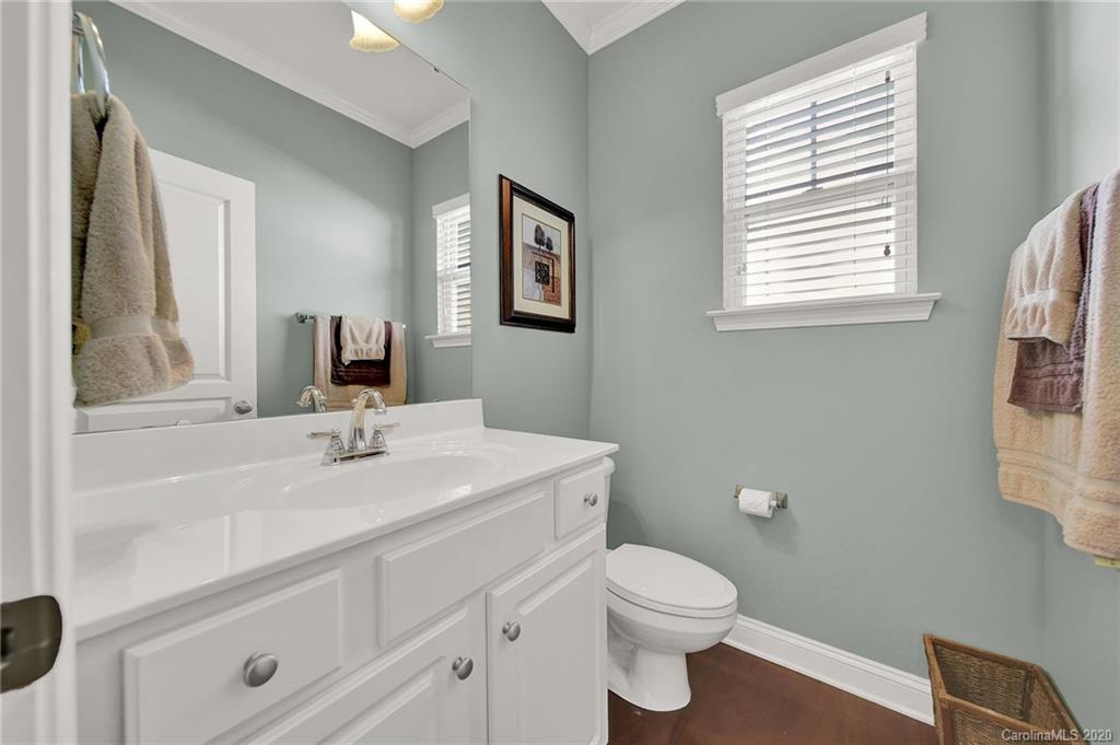 320 Sand Paver Way Fort Mill, SC 29708 - Photo 18 of 42 a bathroom with a toilet sink and mirror