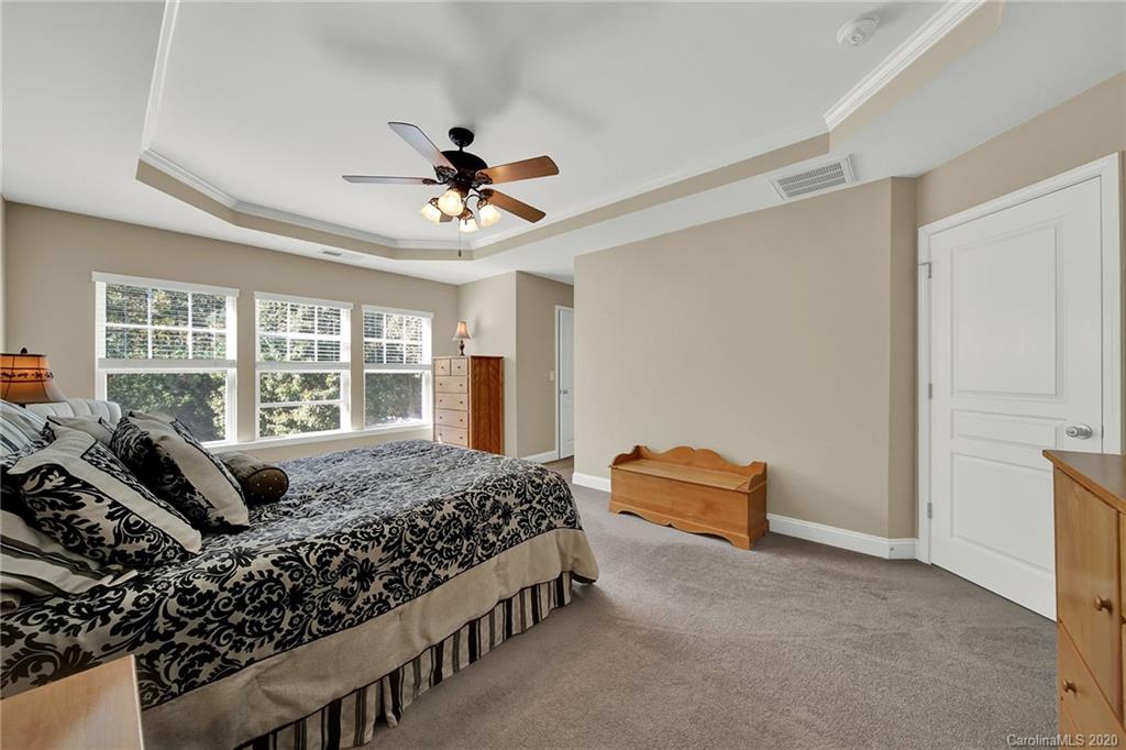 320 Sand Paver Way Fort Mill, SC 29708 - Photo 22 of 42 a bedroom with bed couch and window