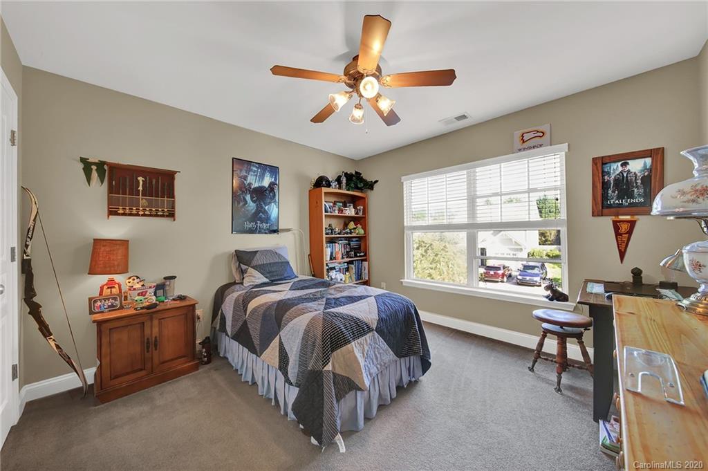 320 Sand Paver Way Fort Mill, SC 29708 - Photo 25 of 42 a spacious bedroom with a bed and a window