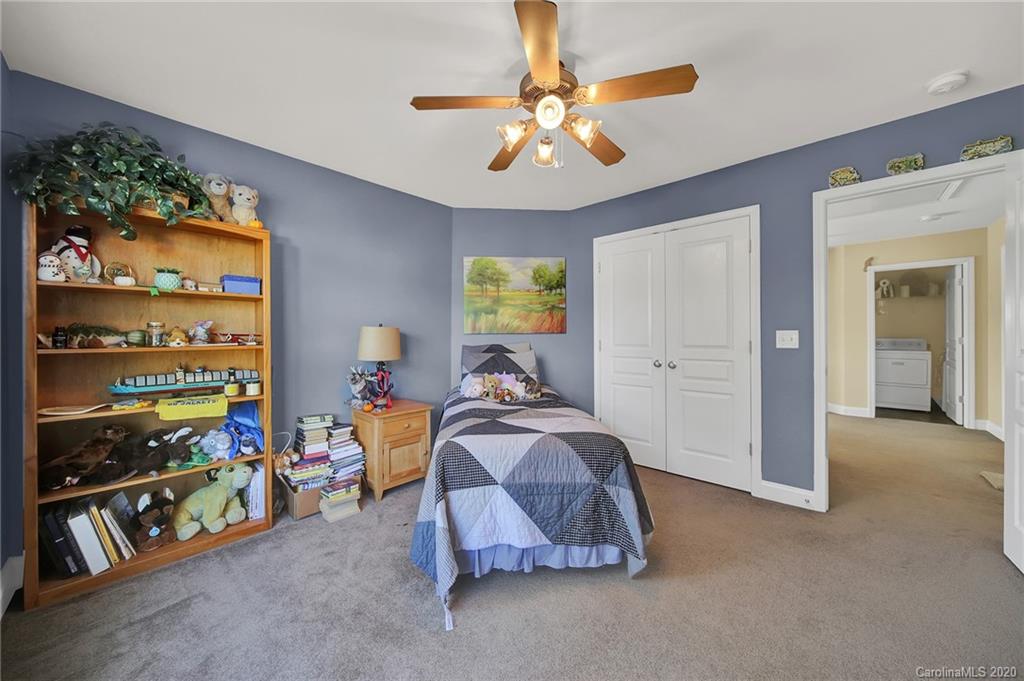 320 Sand Paver Way Fort Mill, SC 29708 - Photo 28 of 42 a bedroom with bed and a window