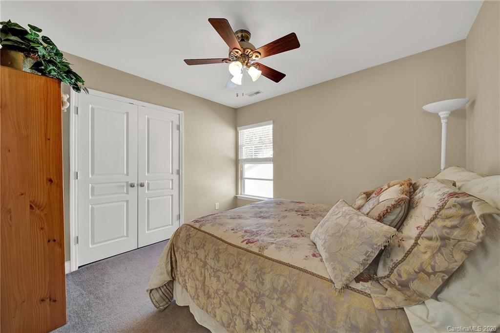 320 Sand Paver Way Fort Mill, SC 29708 - Photo 30 of 42 a bedroom with a bed and window