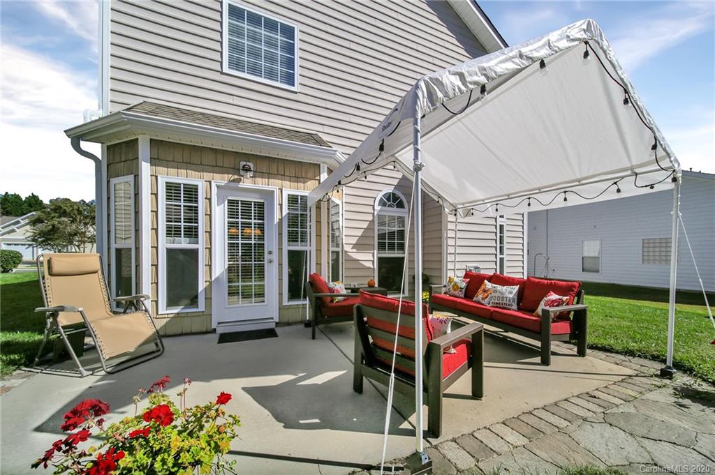 320 Sand Paver Way Fort Mill, SC 29708 - Photo 36 of 42 a building outdoor space with patio furniture and potted plants