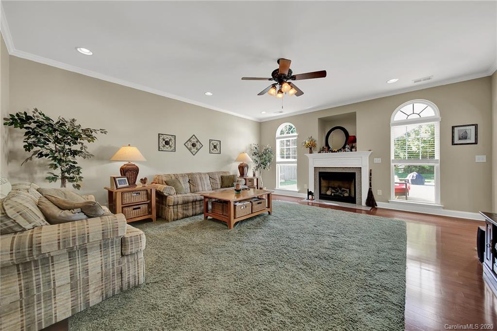 320 Sand Paver Way Fort Mill, SC 29708 - Photo 8 of 42 a living room with furniture and a fireplace