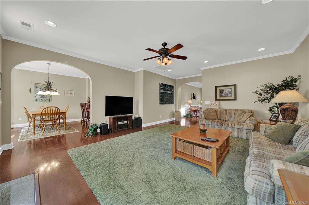 320 Sand Paver Way Fort Mill, SC 29708 - Photo 10 of 42 a living room with furniture and a flat screen tv