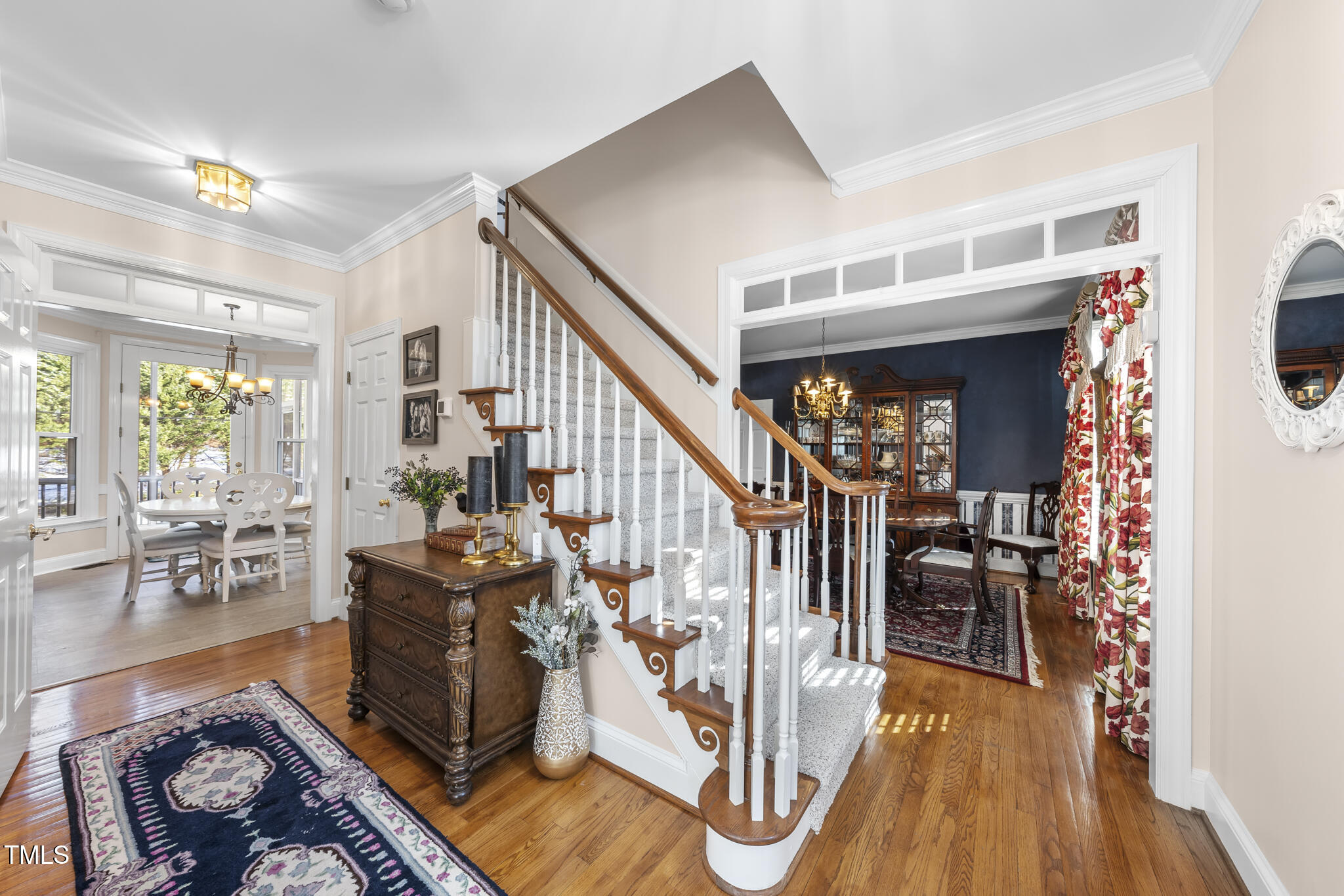 12016 Pembridge Lane Raleigh, NC 27613 - Photo 2 of 52 a living room with furniture and wooden floor