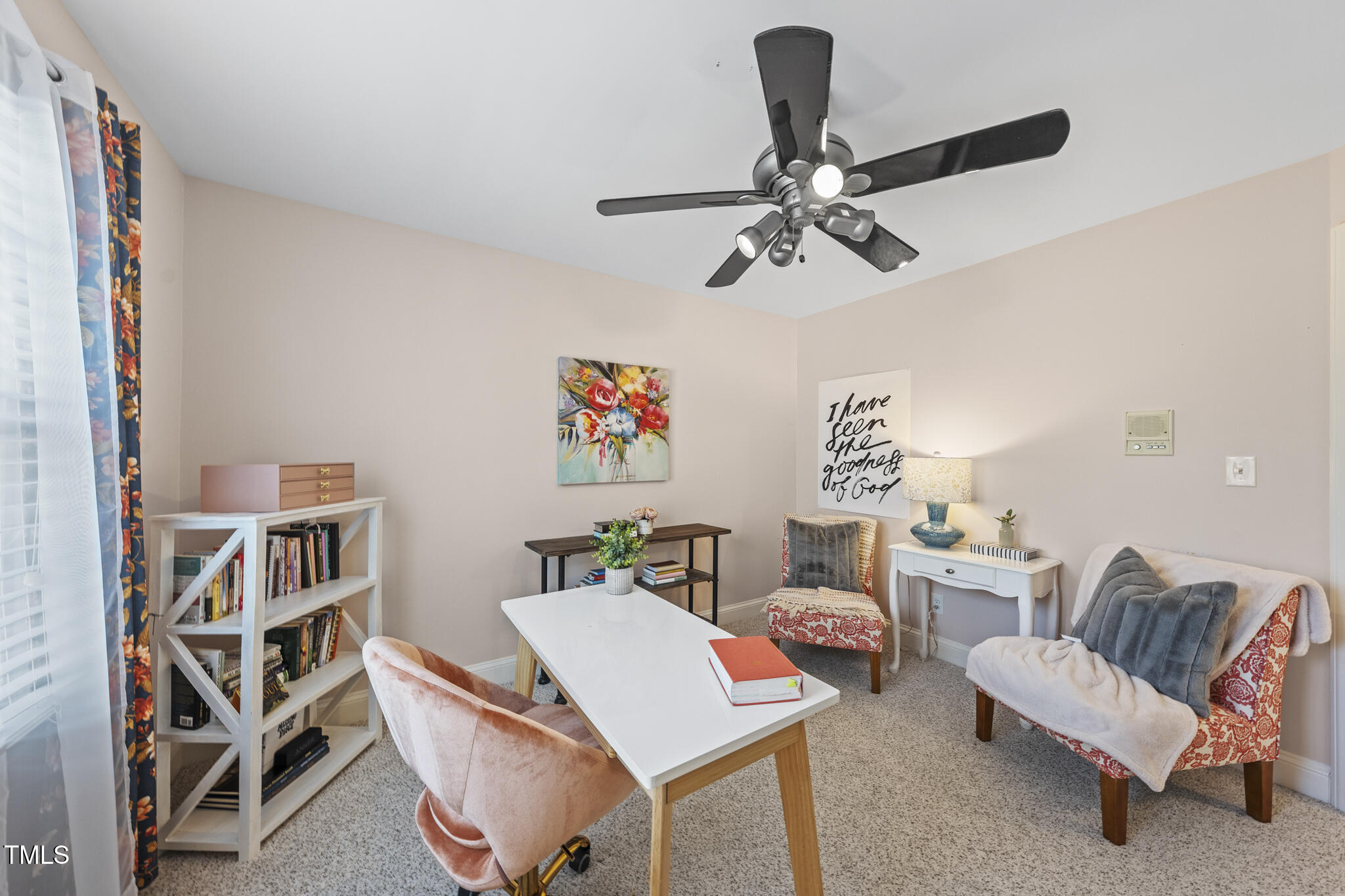 12016 Pembridge Lane Raleigh, NC 27613 - Photo 29 of 52 a view of a livingroom with furniture and a book shelf