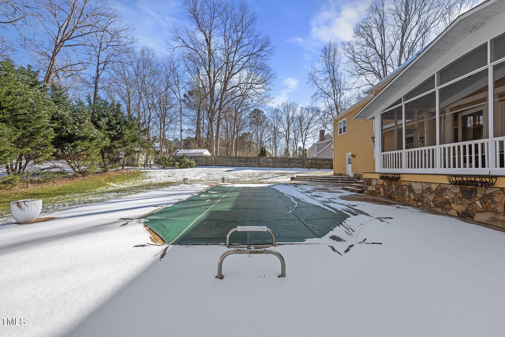 12016 Pembridge Lane Raleigh, NC 27613 - Photo 42 of 52 a view of a backyard patio and fire pit