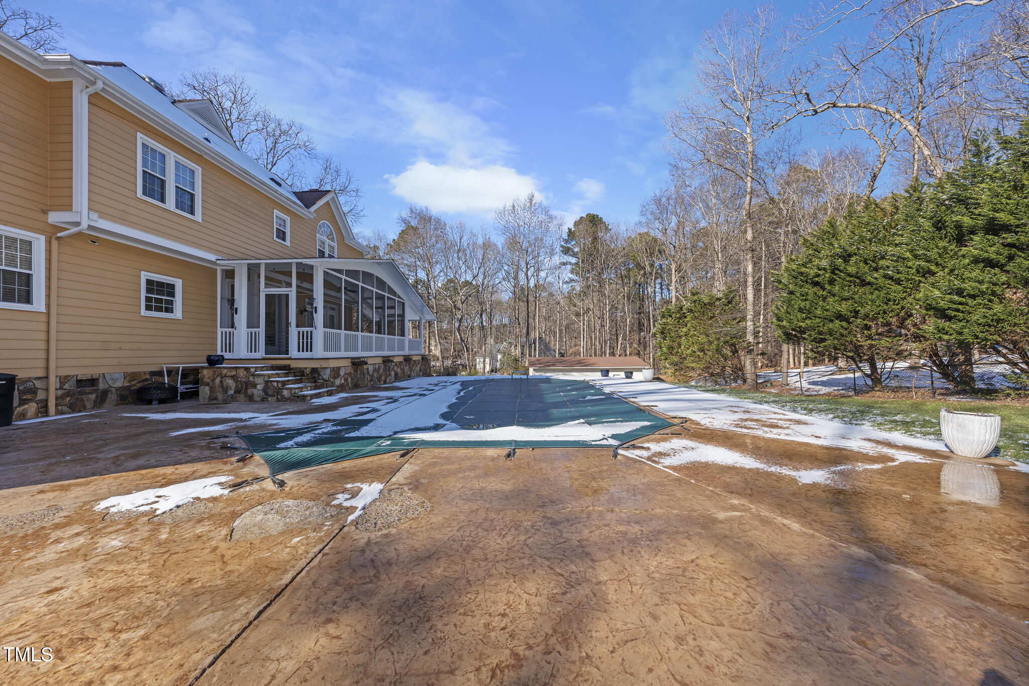 12016 Pembridge Lane Raleigh, NC 27613 - Photo 43 of 52 a view of a house with snow on the road