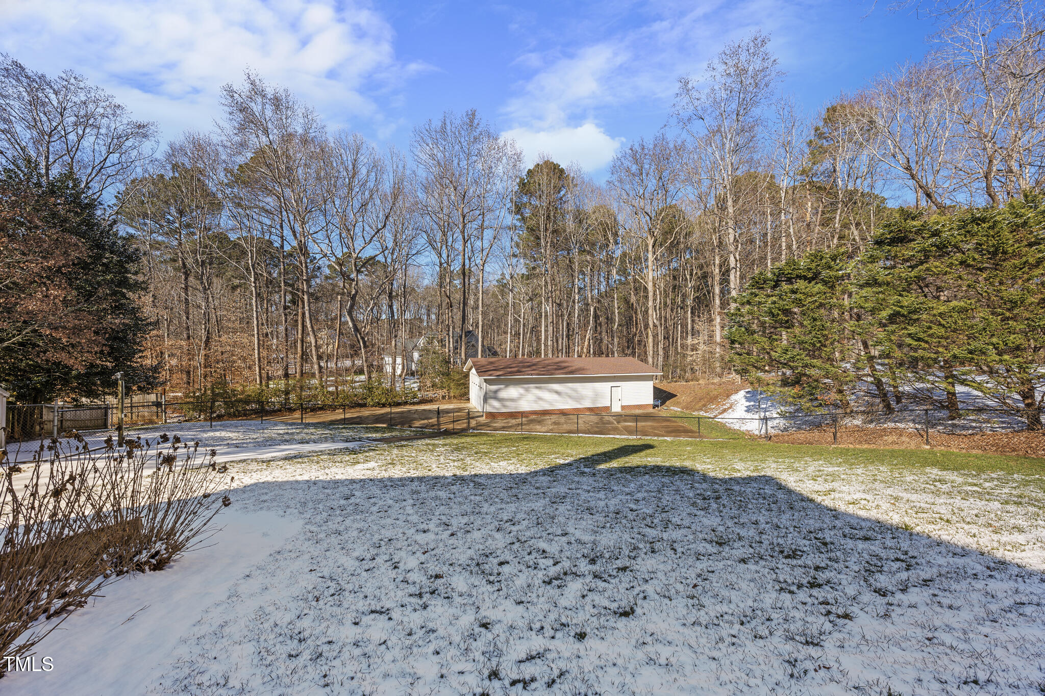 12016 Pembridge Lane Raleigh, NC 27613 - Photo 44 of 52 a view of a yard with large trees