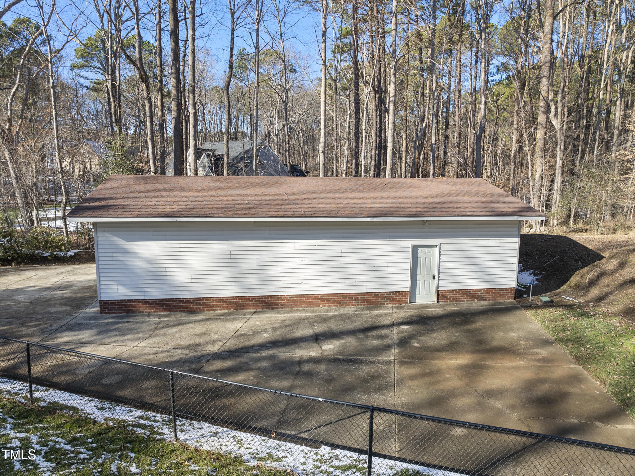 12016 Pembridge Lane Raleigh, NC 27613 - Photo 46 of 52 a view of backyard with large trees