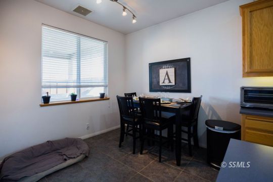 812 South Nevada Street Ridgecrest, CA 93555 - Photo 12 of 34 a view of a dining room with furniture and window