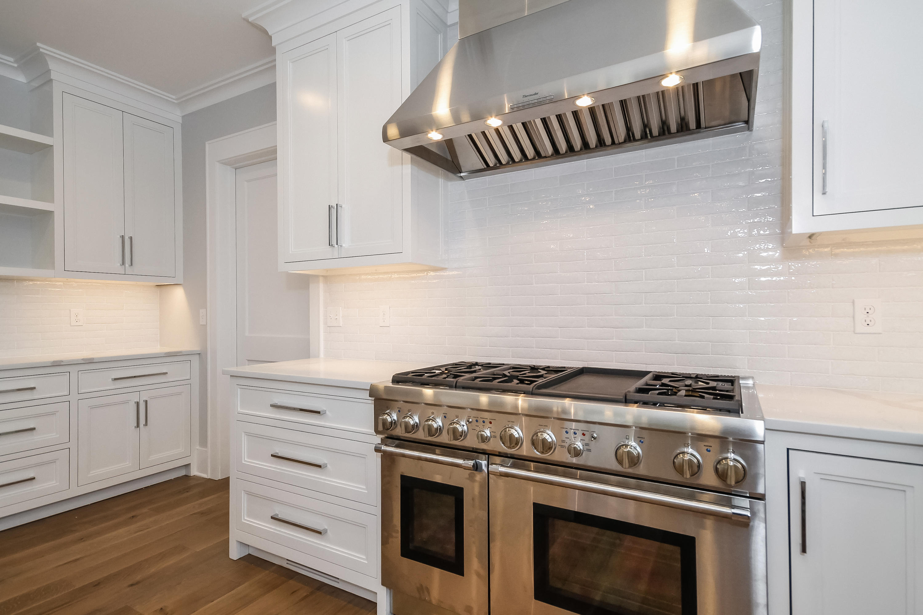 30 Relihan Road Darien, CT 06820 - Photo 11 of 47 a stove top oven sitting inside of a kitchen