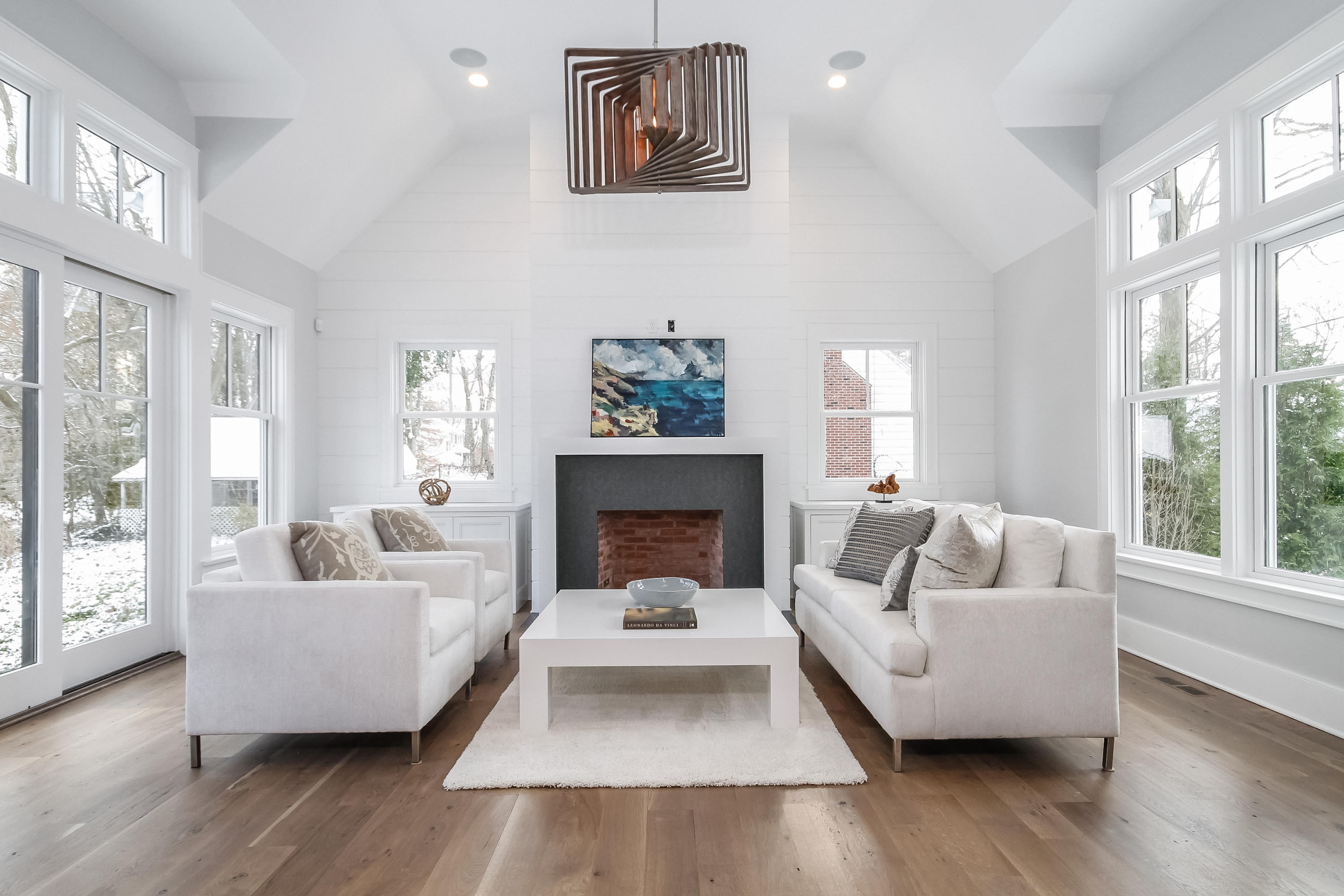 30 Relihan Road Darien, CT 06820 - Photo 15 of 47 a living room with furniture and a fireplace