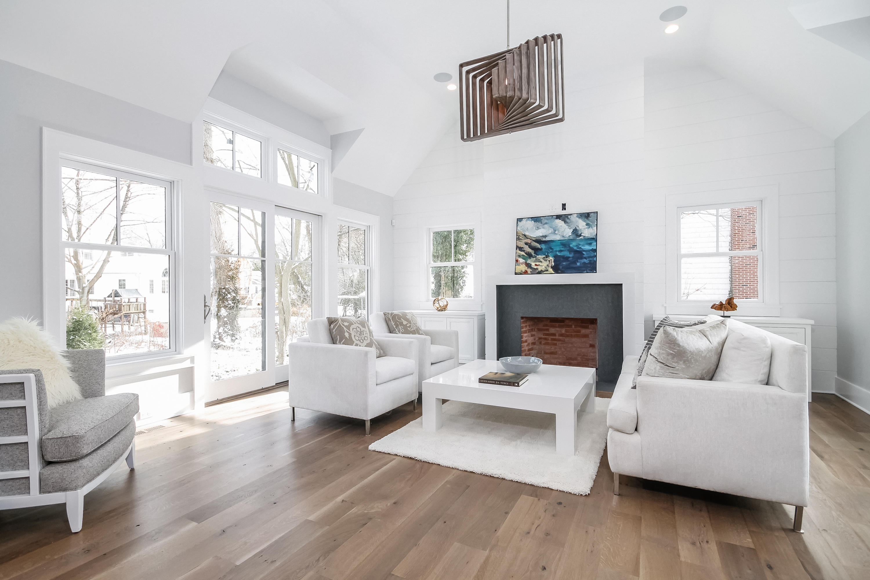 30 Relihan Road Darien, CT 06820 - Photo 16 of 47 a living room with furniture and a fireplace