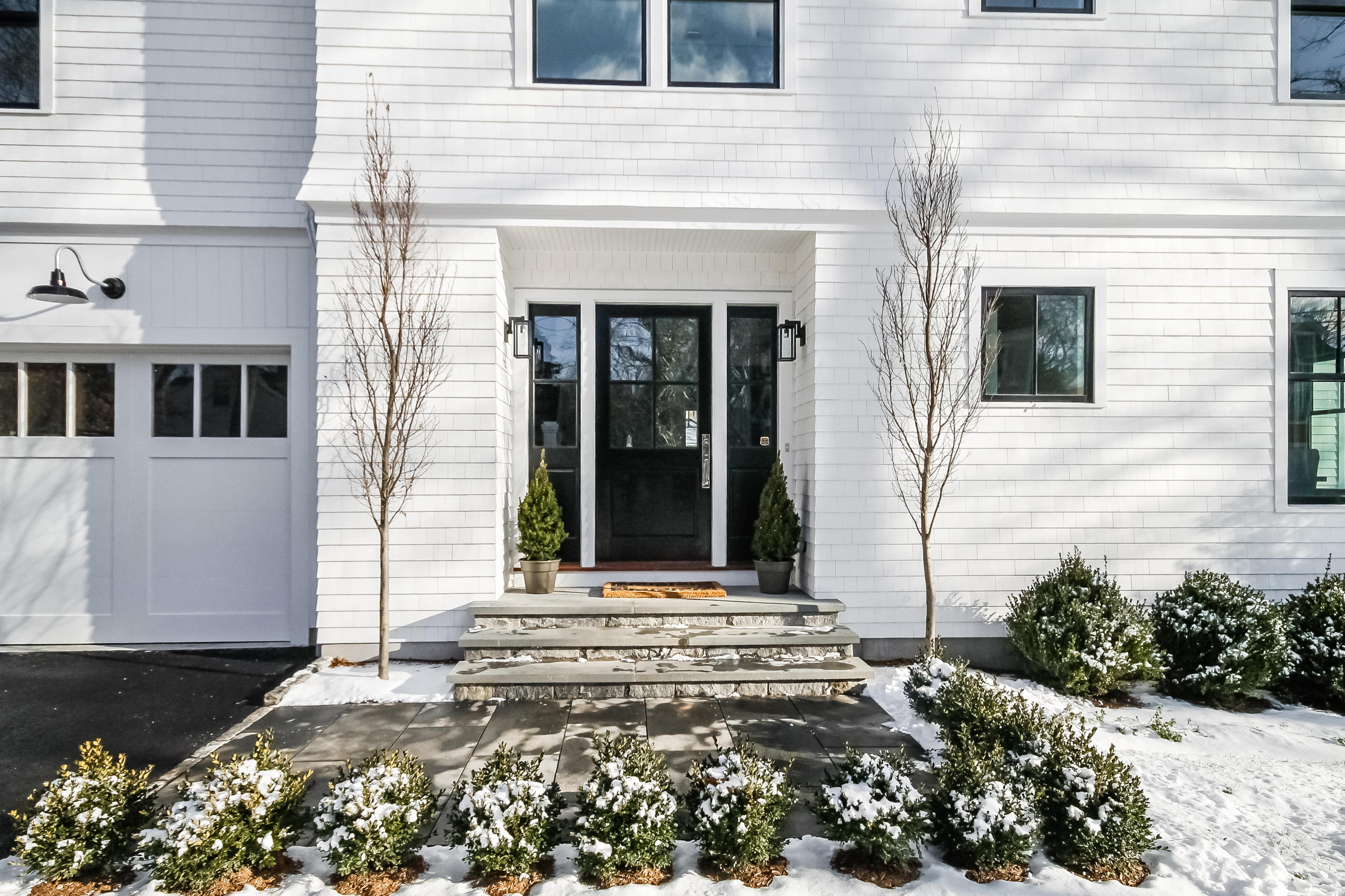 30 Relihan Road Darien, CT 06820 - Photo 2 of 47 a front view of a house with a garden