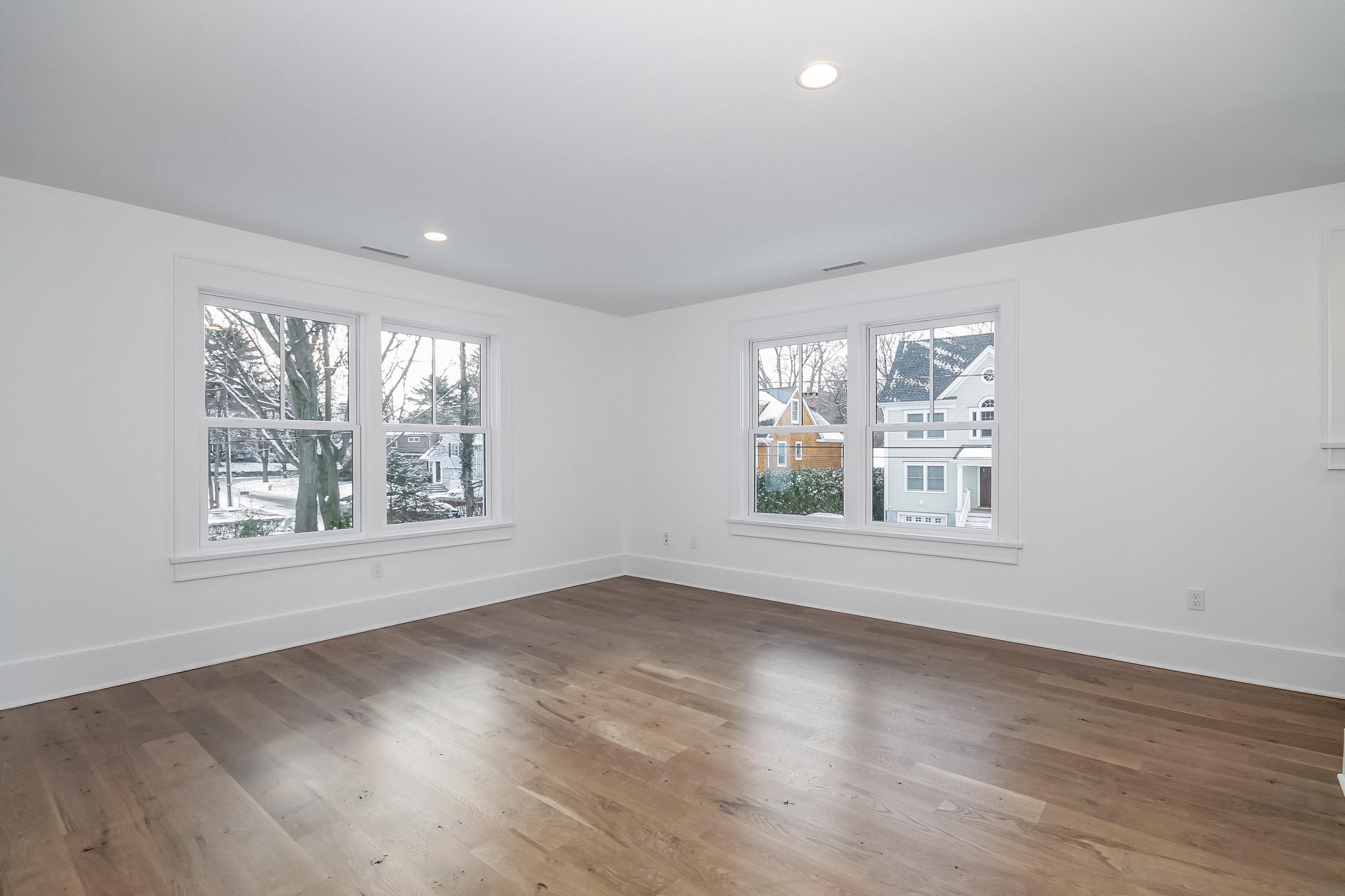 30 Relihan Road Darien, CT 06820 - Photo 28 of 47 a view of an empty room with wooden floor and a window
