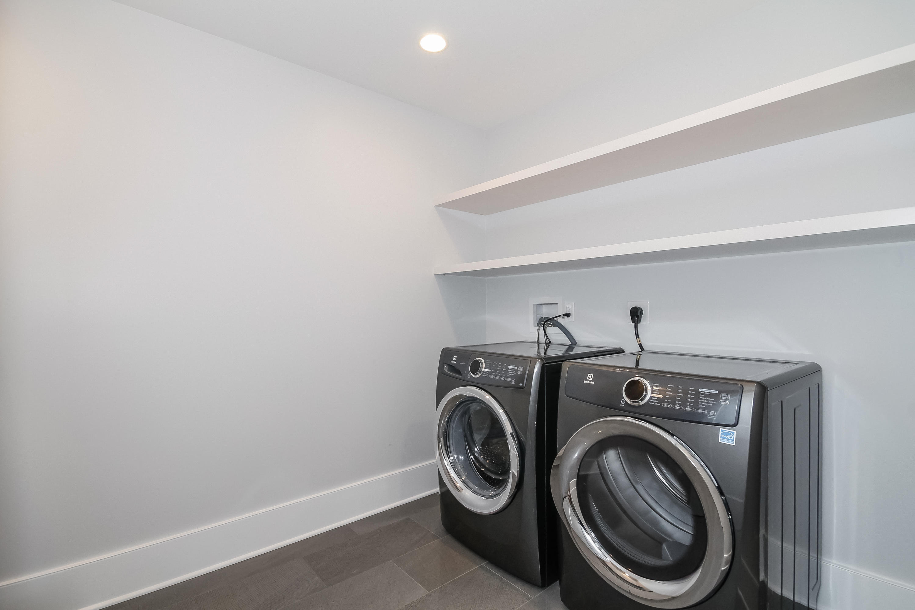 30 Relihan Road Darien, CT 06820 - Photo 33 of 47 a utility room with dryer and washer