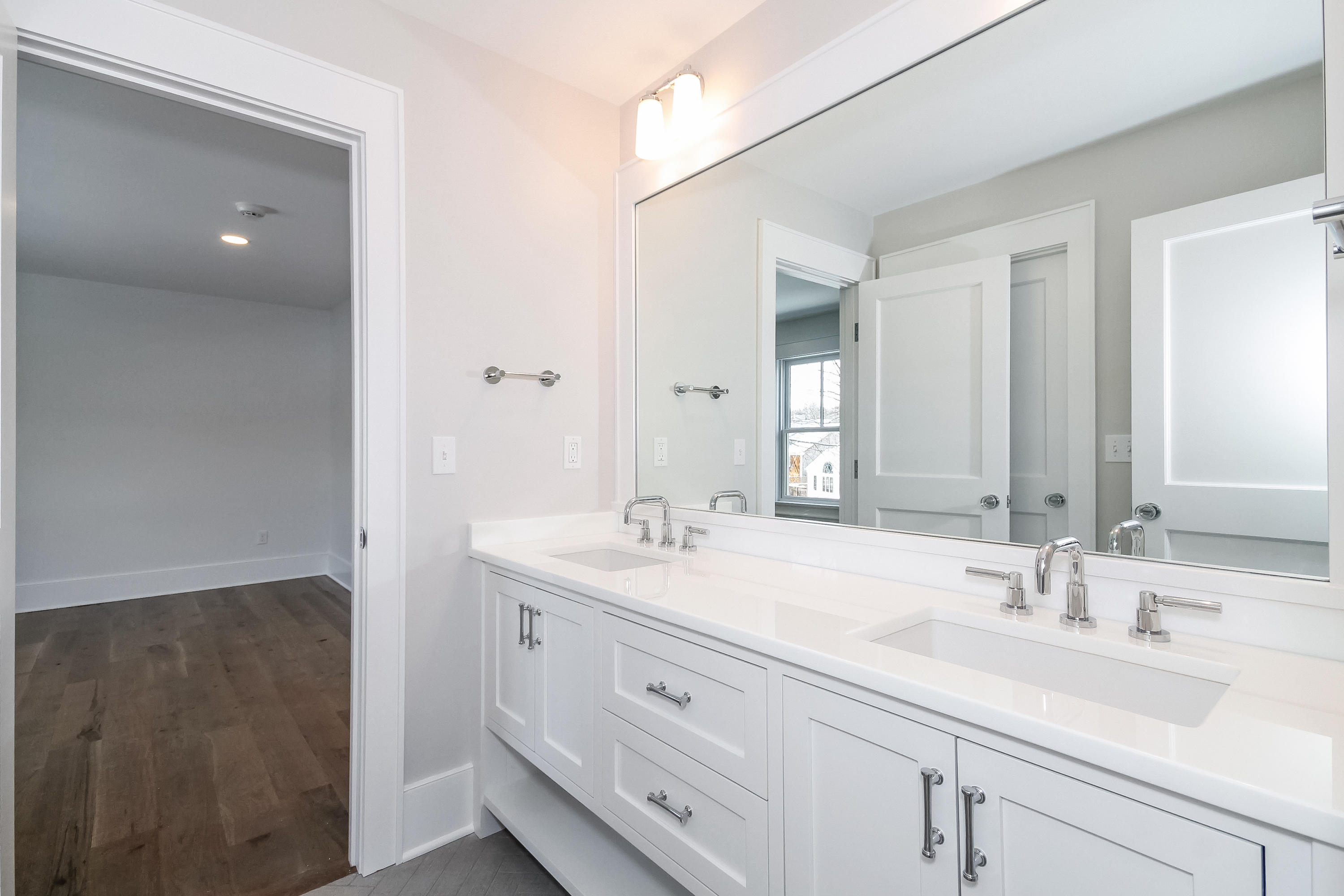 30 Relihan Road Darien, CT 06820 - Photo 35 of 47 a bathroom with double sink and a mirror